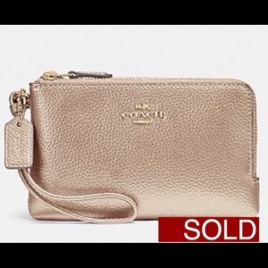 SOLD-Coach Platinum Wristlet $95Leather Phone Case